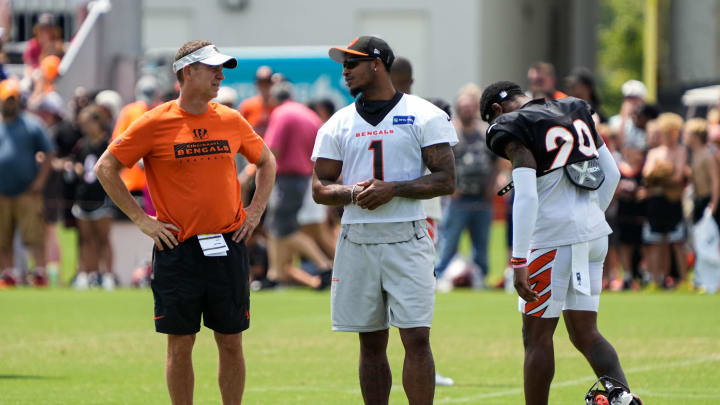 Bengals Ja'Marr Chase hangs out with coaches and players during their training camp on Tuesday July 30, 2024.