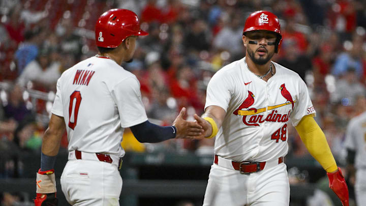 Sep 3, 2025; St. Louis, Missouri, USA;  St. Louis Cardinals designated hitter Ivan Herrera (48) celebrates with shortstop Masyn Winn (0) after they scored against the Athletics during the third inning at Busch Stadium. Mandatory Credit: Jeff Curry-Imagn Images