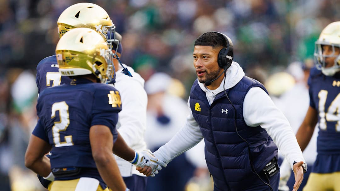 Notre Dame head coach Marcus Freeman celebrates after a touchdown in the first half of a NCAA football game against Syracuse at Notre Dame Stadium on Saturday, Nov. 22, 2025, in South Bend.