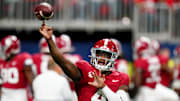 Dec 2, 2023; Atlanta, GA, USA; Alabama Crimson Tide quarterback Jalen Milroe (4) warms up before the SEC Championship against the Georgia Bulldogs at Mercedes-Benz Stadium. Mandatory Credit: John David Mercer-Imagn Images