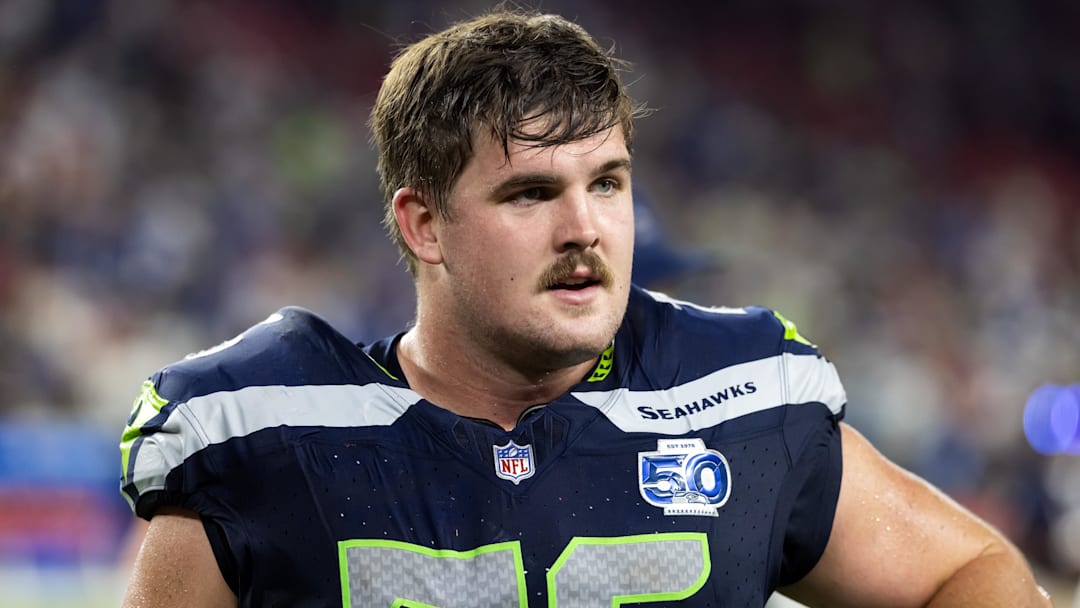 Sep 25, 2025; Glendale, Arizona, USA; Seattle Seahawks guard Grey Zabel (76) against the Arizona Cardinals at State Farm Stadium. Mandatory Credit: Mark J. Rebilas-Imagn Images