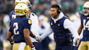 Notre Dame head coach Marcus Freeman celebrates after a touchdown in the first half of a NCAA football game against Syracuse at Notre Dame Stadium on Saturday, Nov. 22, 2025, in South Bend.