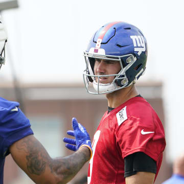 Jul 27, 2023; East Rutherford, NJ, USA;  New York Giants quarterback Daniel Jones (8) and tight end Lawrence Cager (83) on day two of training camp at the Quest Diagnostics Training Facility. Mandatory Credit: Danielle Parhizkaran-USA TODAY Sports