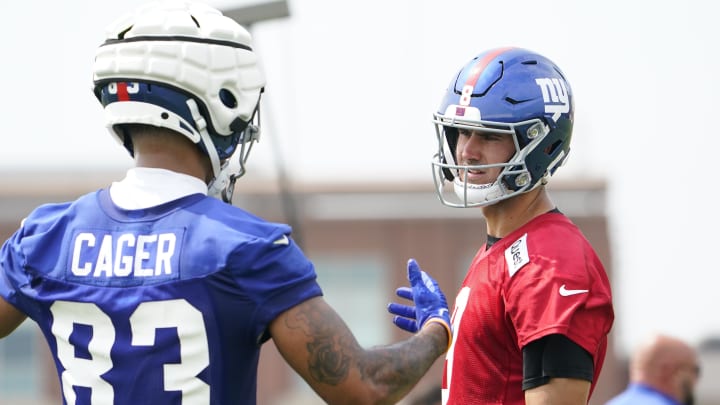 Jul 27, 2023; East Rutherford, NJ, USA;  New York Giants quarterback Daniel Jones (8) and tight end Lawrence Cager (83) on day two of training camp at the Quest Diagnostics Training Facility. Mandatory Credit: Danielle Parhizkaran-USA TODAY Sports