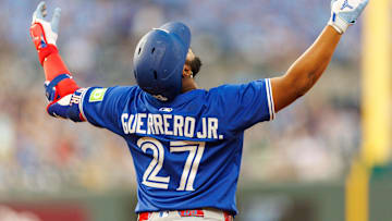Sep 20, 2025; Kansas City, Missouri, USA; Toronto Blue Jays first base Vladimir Guerrero Jr. (27) reacts to a play during the fourth inning against the Kansas City Royals at Kauffman Stadium.