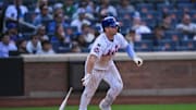 Sep 21, 2025; New York City, New York, USA; New York Mets first baseman Pete Alonso (20) hits a single against the Washington Nationals during the eighth inning at Citi Field. Mandatory Credit: John Jones-Imagn Images