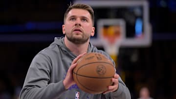 Los Angeles Lakers guard Luka Doncic warms up before a game against the Minnesota Timberwolves.