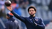 Dec 22, 2024; Chicago, Illinois, USA; Chicago Bears quarterback Caleb Williams (18) warms up before a game against the Detroit Lions at Soldier Field. Mandatory Credit: Daniel Bartel-Imagn Images