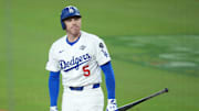 Oct 29, 2025; Los Angeles, California, USA; Los Angeles Dodgers first baseman Freddie Freeman (5) reacts after striking out in the ninth inning against the Toronto Blue Jays during game five of the 2025 MLB World Series at Dodger Stadium. Mandatory Credit: Kirby Lee-Imagn Images