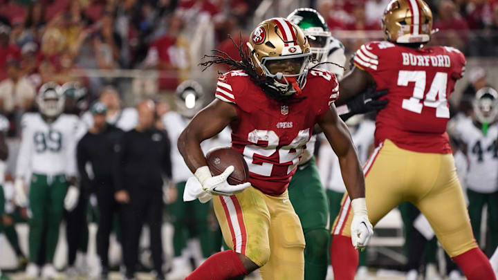 Sep 9, 2024; Santa Clara, California, USA; San Francisco 49ers running back Jordan Mason (24) rushes against the New York Jets in the fourth quarter at Levi's Stadium. Mandatory Credit: David Gonzales-Imagn Images