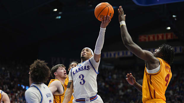 DaJuan Harris, Jr. drives against Iowa Stat
