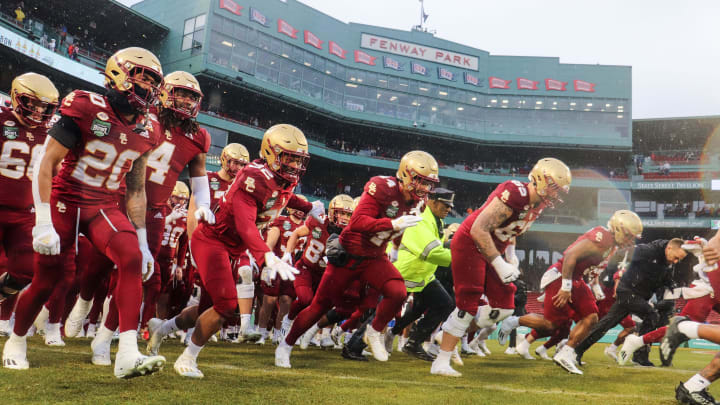 The Boston College football team took the field before the second annual Wasabi Fenway Bowl vs. SMU at Fenway Park on Thursday, Dec. 28, 2023.