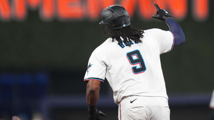 Jul 24, 2024; Miami, Florida, USA;  Miami Marlins first baseman Josh Bell (9) rounds the bases after hitting a solo hime run in the fourth inning against the Baltimore Orioles at loanDepot Park. Mandatory Credit: Jim Rassol-USA TODAY Sports