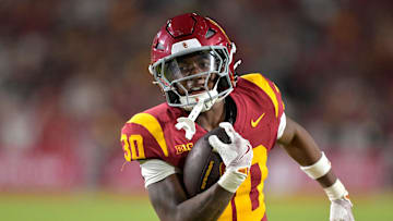 Sep 6, 2025; Los Angeles, California, USA; USC Trojans running back King Miller (30) carries the ball down the field for a touchdown in the second half against the Georgia Southern Eagles at the Los Angeles Memorial Coliseum. Mandatory Credit: Jayne Kamin-Oncea-Imagn Images