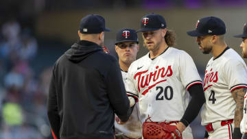 May 8, 2024; Minneapolis, Minnesota, USA; Minnesota Twins starting pitcher Chris Paddack (20) gets relieved from the game from Minnesota Twins manager Rocco Baldelli against the Seattle Mariners in the sixth inning at Target Field. Mandatory Credit: Jesse Johnson-USA TODAY Sports