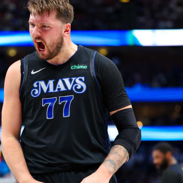 Feb 22, 2024; Dallas, Texas, USA;  Dallas Mavericks guard Luka Doncic (77) reacts during the first half against the Phoenix Suns at American Airlines Center. Mandatory Credit: Kevin Jairaj-USA TODAY Sports