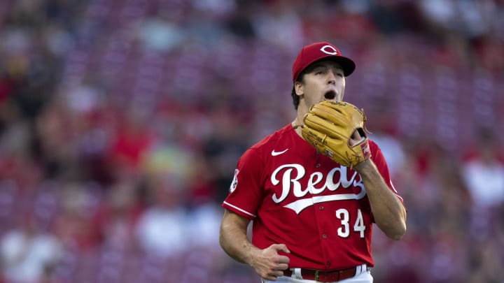 Sep 23, 2023; Cincinnati, Ohio, USA;  Cincinnati Reds starting pitcher Connor Phillips (34) reacts to striking out three batters in the first inning against the Pittsburgh Pirates at Great American Ball Park. Mandatory Credit: The Cincinnati Enquirer-USA TODAY Sports