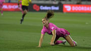 May 23, 2024; Los Angeles, California, USA; San Diego Wave FC forward Alex Morgan (13) reacts in the second half against the Angel City FC at BMO Stadium. 