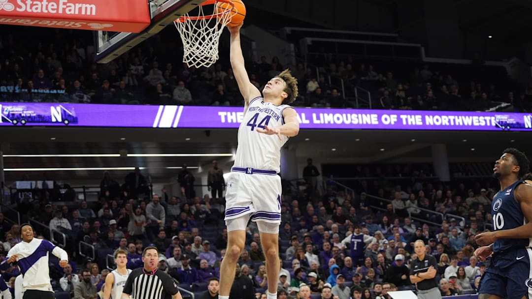 Jan 29, 2026; Evanston, Illinois, USA; Northwestern Wildcats guard Angelo Ciaravino (44) goes up for a dunk against the Penn State Nittany Lions during the second half at Welsh-Ryan Arena. Mandatory Credit: David Banks-Imagn Images