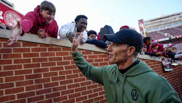 Oklahoma coach Brent Venables celebrates with fans after a college football game between the University of Oklahoma Sooners (OU) and the Missouri Tigers at Gaylord Family Ð Oklahoma Memorial Stadium in Norman, Okla., on Saturday, Nov. 22, 2025. Oklahoma won 17-6.