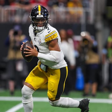 Sep 8, 2024; Atlanta, Georgia, USA; Pittsburgh Steelers quarterback Justin Fields (2) drops back to pass against the Atlanta Falcons in the fourth quarter at Mercedes-Benz Stadium. Mandatory Credit: Brett Davis-Imagn Images