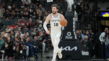 Jan 29, 2024; San Antonio, Texas, USA; San Antonio Spurs forward Cedi Osman (16) dribbles up the court in the first half against the Washington Wizards at Frost Bank Center. 