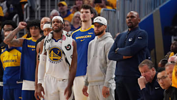May 10, 2025; San Francisco, California, USA; Golden State Warriors guard Stephen Curry (30) watches from the bench during game three against the Minnesota Timberwolves in the second round of the 2025 NBA Playoffs at Chase Center. Mandatory Credit: David Gonzales-Imagn Images