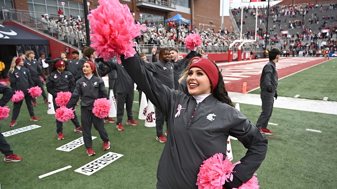 Oct 25, 2025; Pullman, Washington, USA; Washington State Cougars cheerleader performs during a game against the Toledo Rockets in the second half at Gesa Field at Martin Stadium. Washington State Cougars won 28-7. Mandatory Credit: James Snook-Imagn Images Oct 25, 2025; Pullman, Washington, USA; Washington State Cougars cheerleader performs during a game against the Toledo Rockets in the second half at Gesa Field at Martin Stadium. Washington State Cougars won 28-7. Mandatory Credit: James Snook-Imagn Images