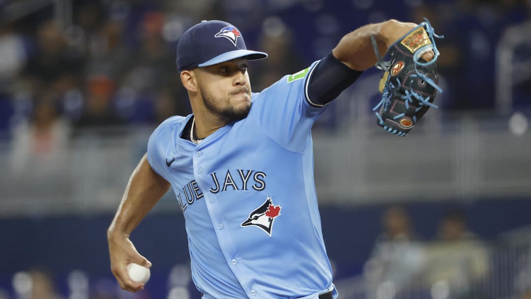 Aug 23, 2025; Miami, Florida, USA;  Toronto Blue Jays starting pitcher Jose Berrios (17) pitches against the Miami Marlins during the first inning at loanDepot Park. 