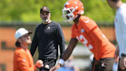 May 10, 2025; Berea, OH, USA; Cleveland Browns head coach Kevin Stefanski watches quarterback Shedeur Sanders (12) during rookie minicamp at CrossCountry Mortgage Campus. Mandatory Credit: Ken Blaze-Imagn Images