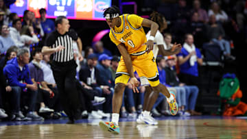 Missouri Tigers guard Anthony Robinson II (0), celebrates after hitting a three in a game versus the Florida Gators this season.