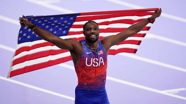 Aug 4, 2024; Paris Saint-Denis, France; Noah Lyles (USA) celebrates after winning the menís 100m final during the Paris 2024 Olympic Summer Games at Stade de France. Mandatory Credit: Andrew Nelles-USA TODAY Sports