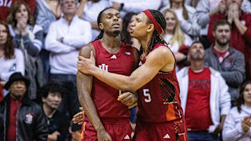 Feb 14, 2025; Bloomington, Indiana, USA; Indiana Hoosiers forward Malik Reneau (5) consoles forward Mackenzie Mgbako (21) after a missed shot at the end of the second half against the UCLA Bruins at Simon Skjodt Assembly Hall. Mandatory Credit: Trevor Ruszkowski-Imagn Images