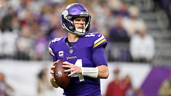 Minnesota Vikings quarterback Sam Darnold sets up to pass against the Atlanta Falcons