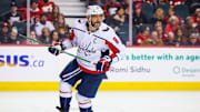 Mar 18, 2024; Calgary, Alberta, CAN; Washington Capitals left wing Alex Ovechkin (8) skates against the Calgary Flames during the first period at Scotiabank Saddledome. Mandatory Credit: Sergei Belski-Imagn Images