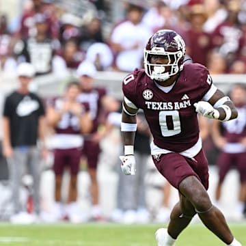 Oct 5, 2024; College Station, Texas, USA; Texas A&M Aggies linebacker Scooby Williams (0) defends in coverage in the second half against the Missouri Tigers at Kyle Field. Mandatory Credit: Maria Lysaker-Imagn Images. 