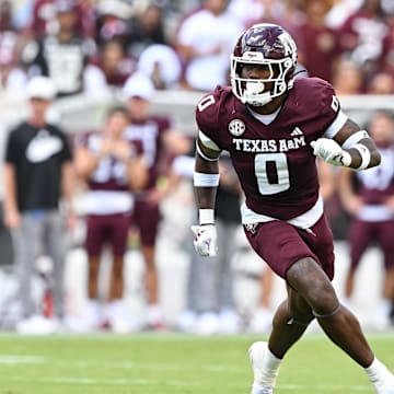 Oct 5, 2024; College Station, Texas, USA; Texas A&M Aggies linebacker Scooby Williams (0) defends in coverage in the second half against the Missouri Tigers at Kyle Field. Mandatory Credit: Maria Lysaker-Imagn Images. 