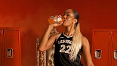 A'ja Wilson drinks Gatorade in a photo shoot.