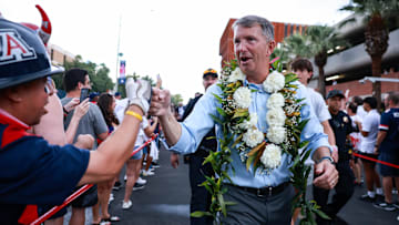 Aug 31, 2024; Tucson, Arizona, USA;  Arizona Wildcats head coach Brent Brennan walks down the Wildcat Walk interacting with fans before the game at Arizona Stadium.