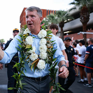 Aug 31, 2024; Tucson, Arizona, USA;  Arizona Wildcats head coach Brent Brennan walks down the Wildcat Walk interacting with fans before the game at Arizona Stadium.