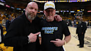 Paul Michael Levesque, known professionally as Triple H, and Pat McAfee pose for a photo prior to game four of the eastern conference finals.