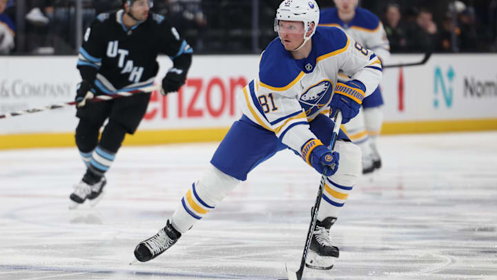 Mar 20, 2025; Salt Lake City, Utah, USA; Buffalo Sabres center Sam Lafferty (81) skates with the puck against the Utah Hockey Club during the first period at Delta Center. Mandatory Credit: Rob Gray-Imagn Images