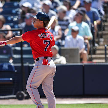 Boston Red Sox outfielder Masataka Yoshida (7) hits a two run home run against the New York Yankees in the sixth inning during spring training at George M. Steinbrenner Field on March 18. 