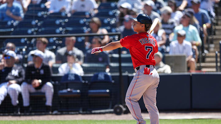 Boston Red Sox outfielder Masataka Yoshida (7) hits a two run home run against the New York Yankees in the sixth inning during spring training at George M. Steinbrenner Field on March 18. Boston Red Sox outfielder Masataka Yoshida (7) hits a two run home run against the New York Yankees in the sixth inning during spring training at George M. Steinbrenner Field on March 18.