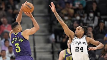 Mar 15, 2025; San Antonio, Texas, USA; New Orleans Pelicans guard CJ McCollum (3) shoots over San Antonio Spurs guard Devin Vassell (24) during the second half at Frost Bank Center. Mandatory Credit: Scott Wachter-Imagn Images