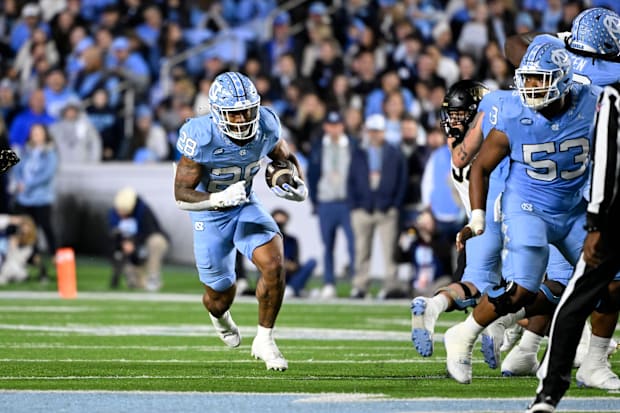North Carolina Tar Heels running back Omarion Hampton  runs in the first quarter at Kenan Memorial Stadium