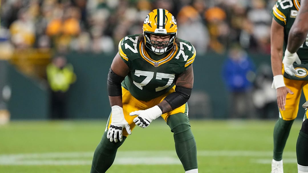 Nov 10, 2025; Green Bay, Wisconsin, USA;  Green Bay Packers offensive tackle Jordan Morgan (77) during the game against the Philadelphia Eagles at Lambeau Field. Mandatory Credit: Jeff Hanisch-Imagn Images