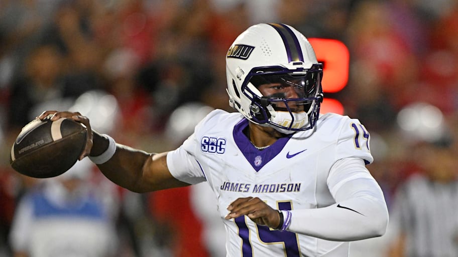 James Madison Dukes quarterback Alonza Barnett III sets to throw at Louisville.