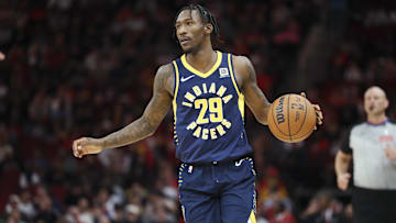 Nov 20, 2024; Houston, Texas, USA; Indiana Pacers guard Quenton Jackson (29) dribbles the ball during the third quarter against the Houston Rockets at Toyota Center. Mandatory Credit: Troy Taormina-Imagn Images