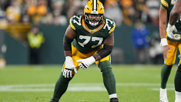 Nov 10, 2025; Green Bay, Wisconsin, USA;  Green Bay Packers offensive tackle Jordan Morgan (77) during the game against the Philadelphia Eagles at Lambeau Field. Mandatory Credit: Jeff Hanisch-Imagn Images